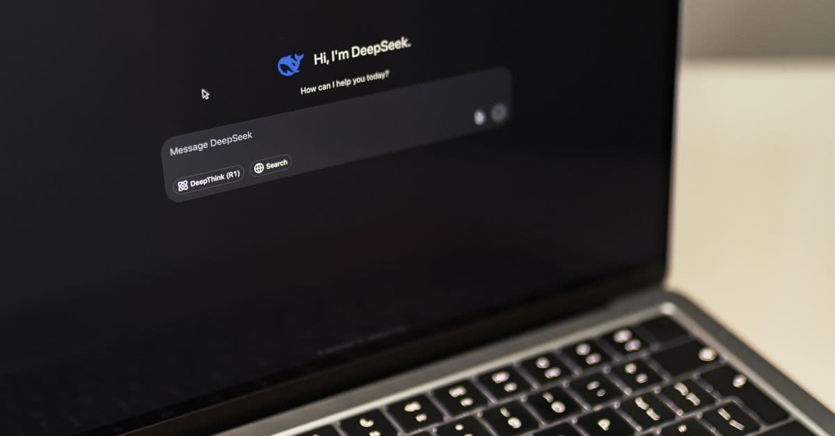 A MacBook displaying the DeepSeek AI interface, showcasing digital innovation.