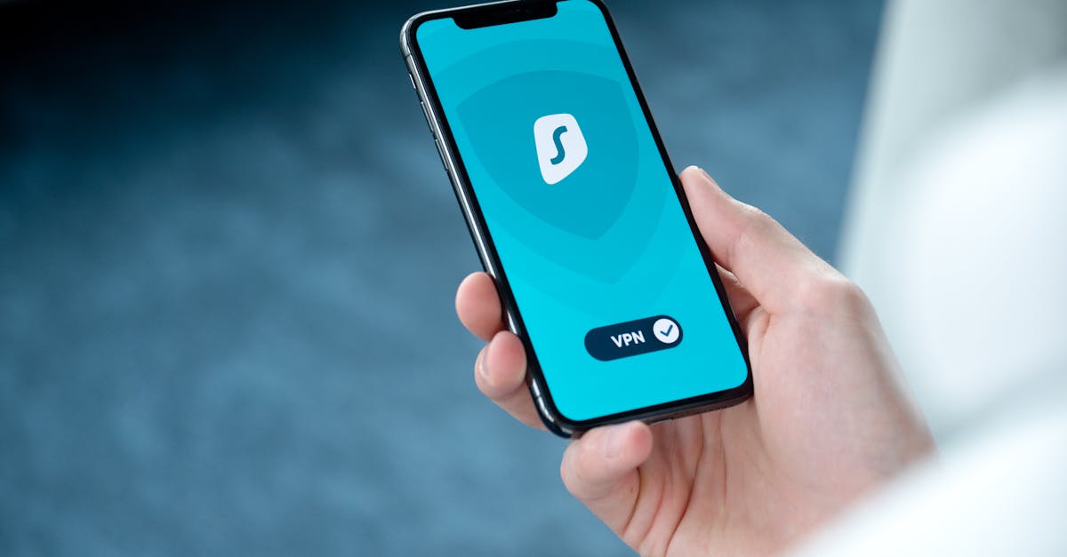 A hand holding a smartphone displaying a VPN app screen for secure online browsing.